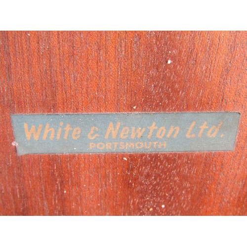 2238 - A White & Newton Ltd long and low retro teak sideboard enclosed by two doors and three long drawers,... 