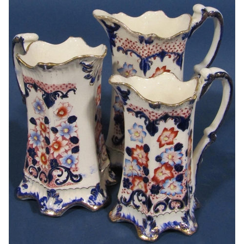 1019 - A large collection of blue and white transfer ware and relief moulded jugs, some with pewter covers,... 