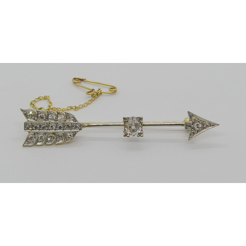 1283 - Fine antique diamond set arrow brooch with millegrain setting, largest diamond 6 x 5mm approx, in bi... 