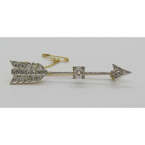 1283 - Fine antique diamond set arrow brooch with millegrain setting, largest diamond 6 x 5mm approx, in bi... 