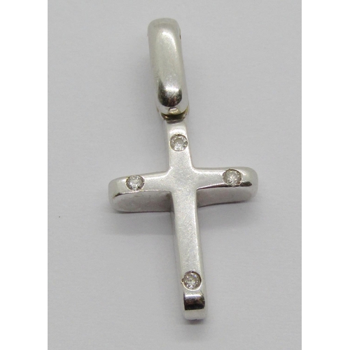 1311 - 18ct white gold cross pendant set with four diamonds, 3.7g