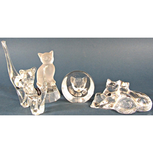 1161 - A collection of glass and crystal cats in various positions.