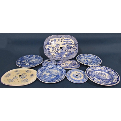 1020 - A collection of 19th century blue and white ware comprising four plates with pastural and country sc... 