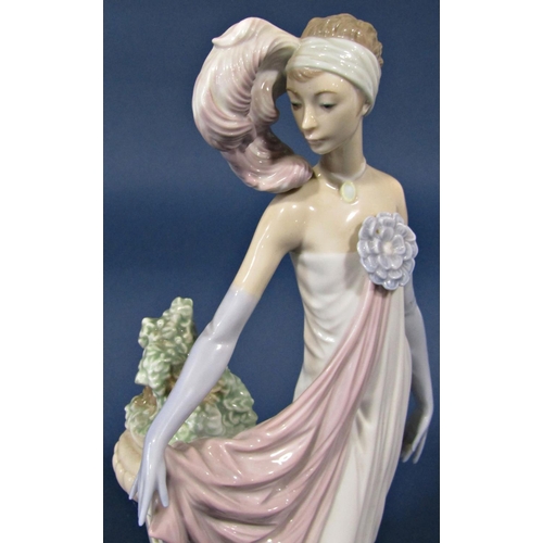 1036 - A Lladro figure of an art deco female in evening dress