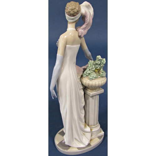 1036 - A Lladro figure of an art deco female in evening dress