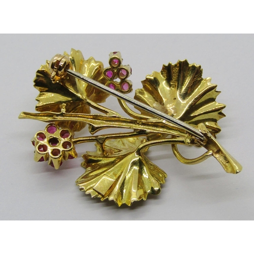 1334 - 18ct naturalistic floral spray brooch set with rubies, maker 'C&F', London 1965 import marks, 7.1g