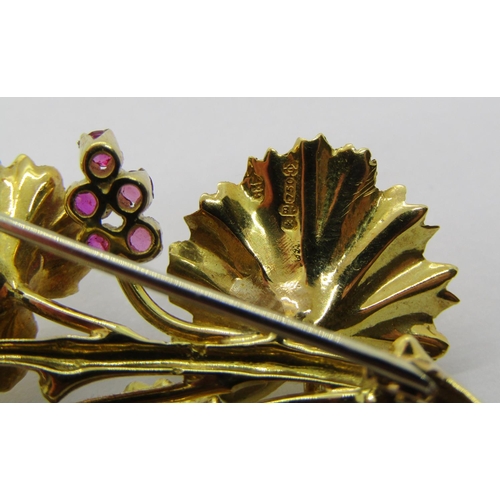 1334 - 18ct naturalistic floral spray brooch set with rubies, maker 'C&F', London 1965 import marks, 7.1g