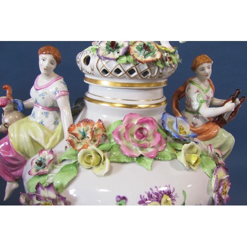 1052 - A substantial continental porcelain oviform vase and cover in the Dresden style, with hand painted f... 