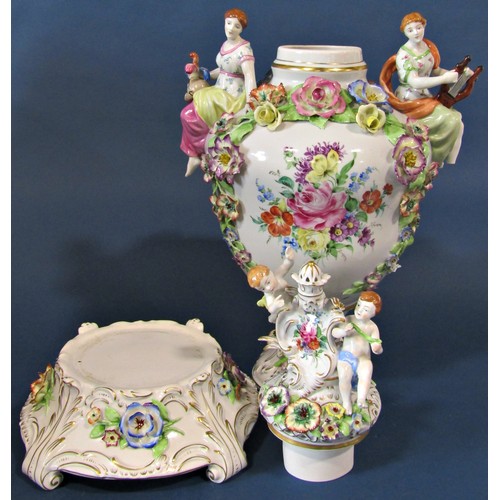 1052 - A substantial continental porcelain oviform vase and cover in the Dresden style, with hand painted f... 