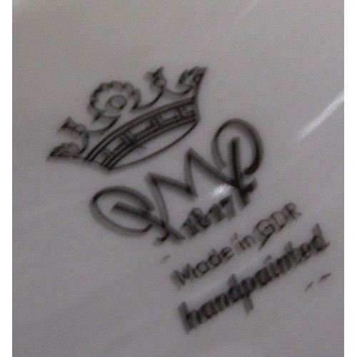 1052 - A substantial continental porcelain oviform vase and cover in the Dresden style, with hand painted f... 