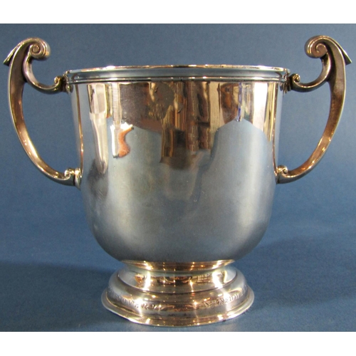 1228 - A silver two handled cup with Seabreake, Discovery, Speedwell and Mary Flowre engraved to the foot, ... 