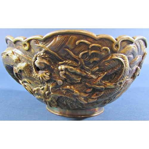 1237 - A Japanese silver metal bowl with entwined dragons and a faint makers stamp to base, 17.5cm diameter... 