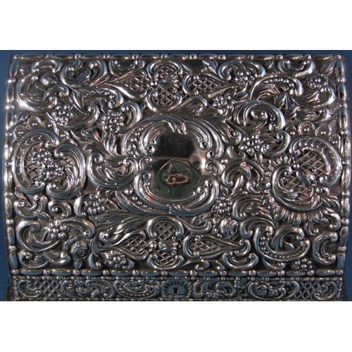 1239 - A silver clad Edwardian desk top Moroccan leather stationery box with embossed floral and scrolled d... 