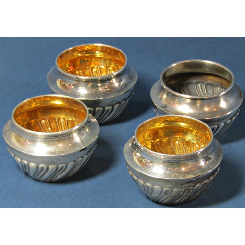 1243 - Four cased silver gilt condiments, Birmingham 1901, maker Hilliard & Thomason, 3.4oz approx