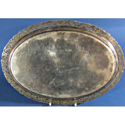 1250 - A silver metal oval dish with pierced foliate border bearing a Dutch rampant lion hallmark, maker ZZ... 