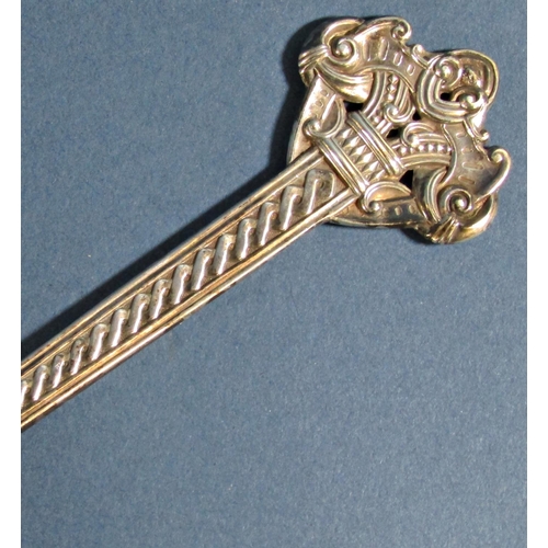 1253 - A Norwegian silver Thune 830 anointing spoon with Celtic patterns