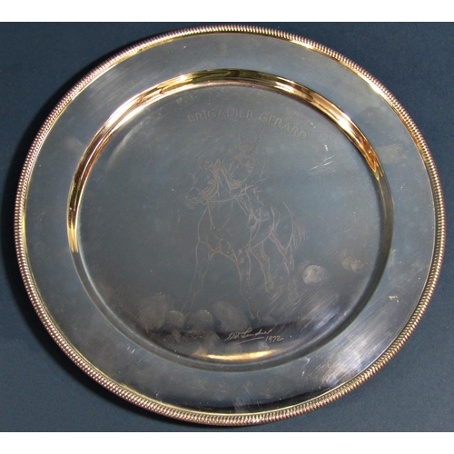 1257 - A silver dish, 23 cm in diameter etched with the image of the racehorse Brigadier Gerard with Joe Me... 