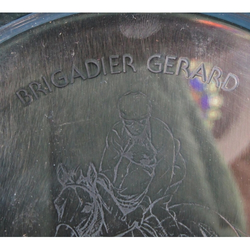 1257 - A silver dish, 23 cm in diameter etched with the image of the racehorse Brigadier Gerard with Joe Me... 