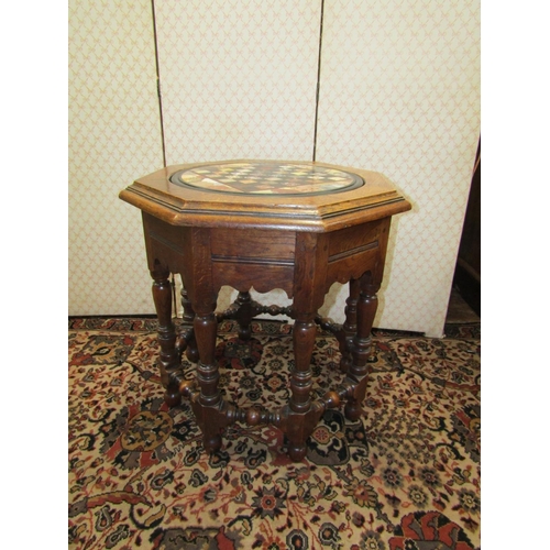 2649 - 19th century games table, the circular Italian marble top set withing an English oak octagonal frame... 