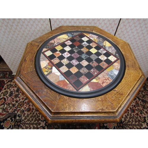 2649 - 19th century games table, the circular Italian marble top set withing an English oak octagonal frame... 