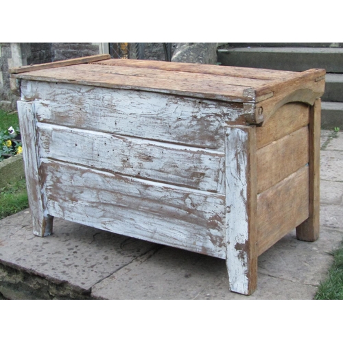 2677 - An antique rustic oak coffer, 112cm wide