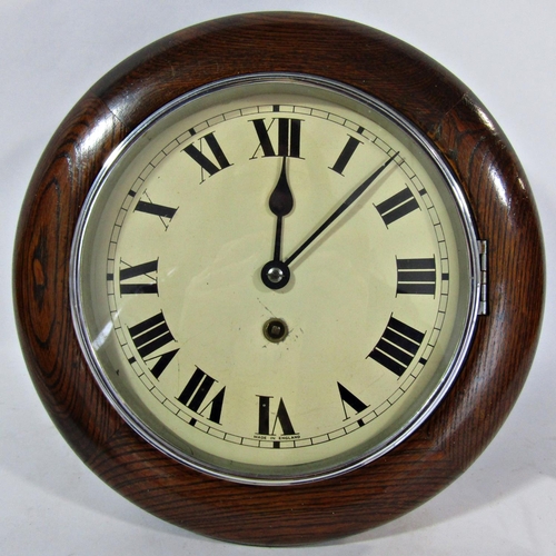 1452 - A small dial clock with oak case, chrome bezel and eight day time piece, the dial 19cm diameter