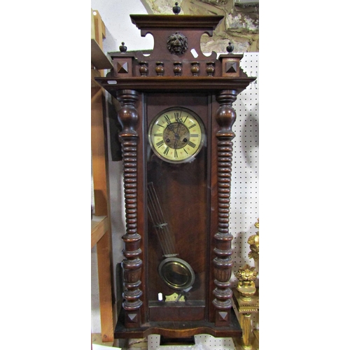 1454 - Late 19th century wall clock with eight day striking movement, the casework with split spindle mould... 