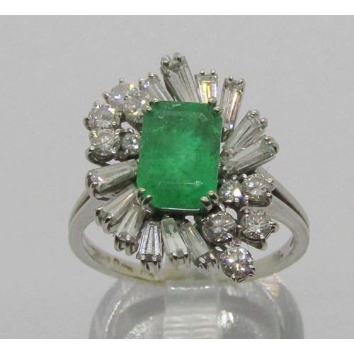 1302 - Vintage 18ct white gold emerald and diamond cocktail ring, with tapered baguette and round cut diamo... 