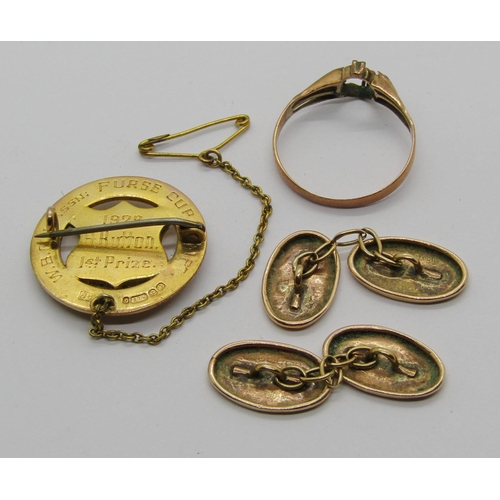 1341 - Group of 9ct jewellery comprising a 1920s medal badge, a pair of cufflinks and a ring, 9.3g total (a... 