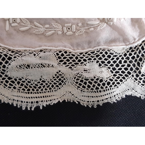 1551 - An impressive pair of vintage knickers in pale pink silk, trimmed with 19th century Flanders lace an... 