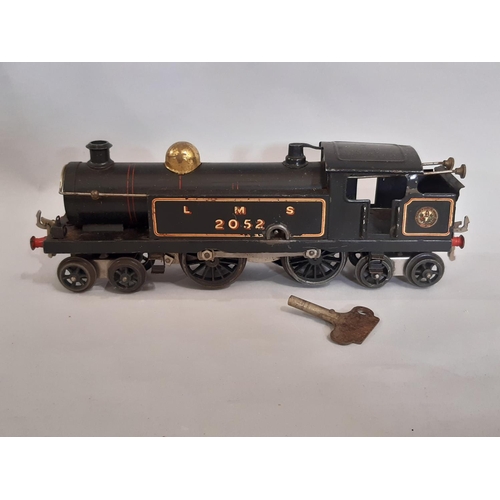 321 - Hornby O gauge clockwork 4-4-4 LMS tank locomotive in black livery, 1920's with box (box in poor con... 