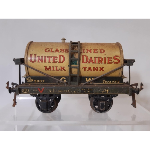 329 - 1930's O gauge United Dairies rail tanker by Bassett-Lowke, marked GW 2007, together with 2 further ... 