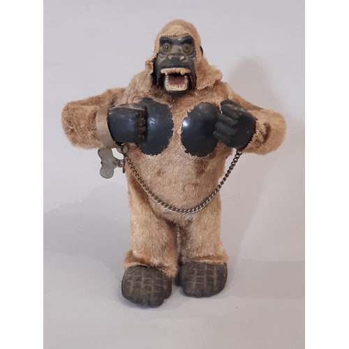 316 - Marx Toys (Japan) 1960's mechanical gorilla with clockwork motor and fur covering; when wound the to... 