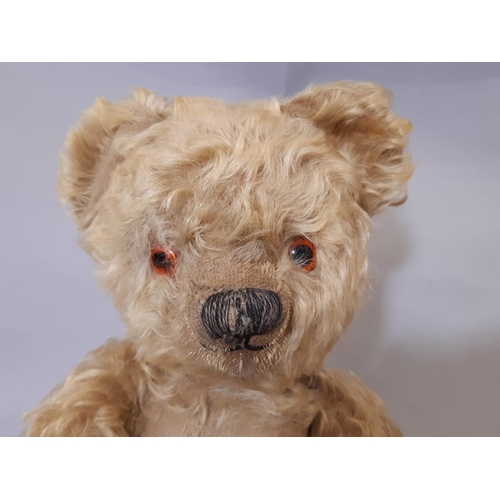 318 - 4 vintage teddy bears, all play worn including a tall firmly stuffed bear with  stitched nose and mo... 