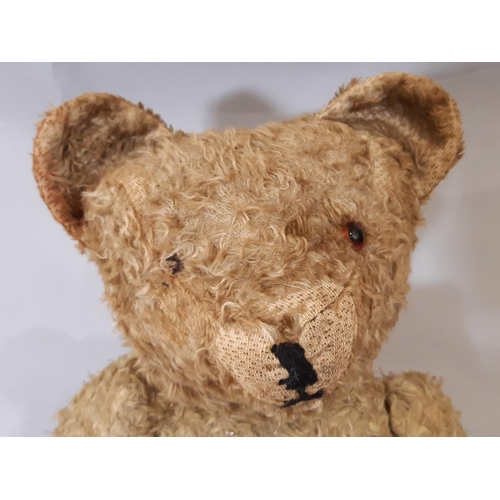 318 - 4 vintage teddy bears, all play worn including a tall firmly stuffed bear with  stitched nose and mo... 