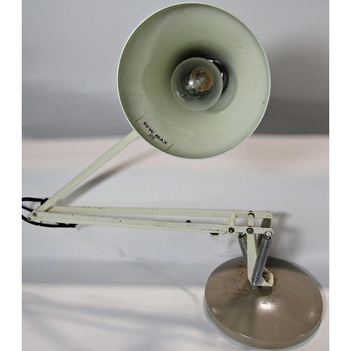 1572 - An angle poise type table lamp in creamy white finish and an oval looking glass within a mahogany wo... 