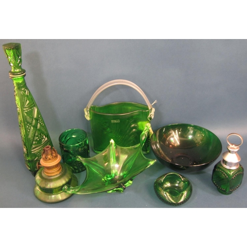 1163 - A collection of eighteen pieces of green glass including, ashtrays, bowls, ice bucket, bottles, vase... 