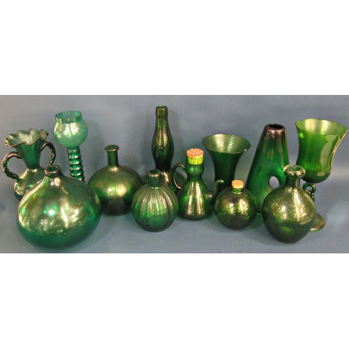 1166 - A collection of twelve green glass pieces, mainly vases of various shapes and sizes.