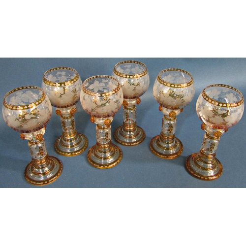 1171 - Six amber glass hock wine glasses with etched vine leaf decoration, five cut glass wine glass, and a... 