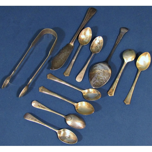 1268 - Silver flatware consisting of a sugar tong, a fish knife, a jam spoon and eight assorted teaspoons.