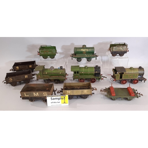 302 - O gauge Hornby railway collection comprising clockwork locomotives, wagons and track; includes 3x 0-... 