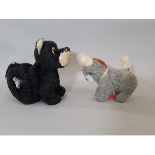 326 - 1960's ride-on dog toy by Wendy Boston (Playsafe) height 62cm together with vintage clockwork donkey... 