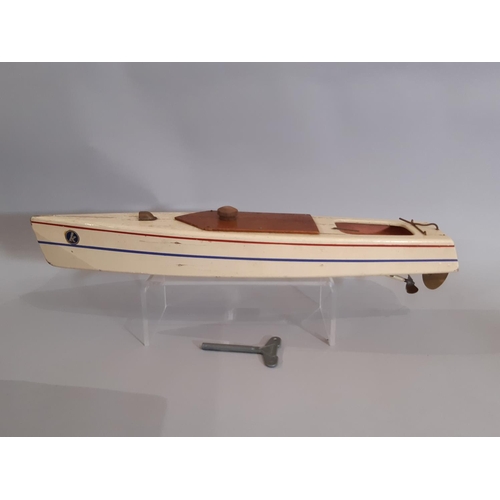 307 - Kellner Boats clockwork speed boat of wooden construction finished in cream, clockwork action, brake... 