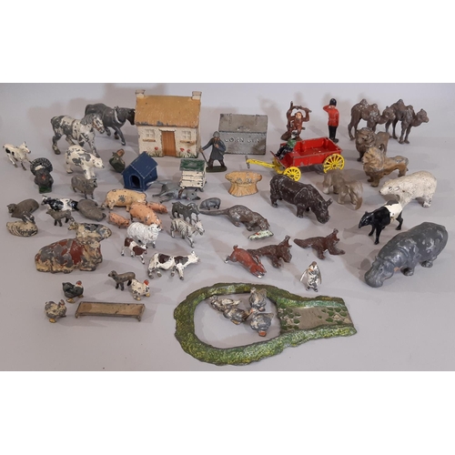 309 - Mixed lot of vintage toys including Britains lead painted farm and zoo figures, 2 boxes of Meccano, ... 