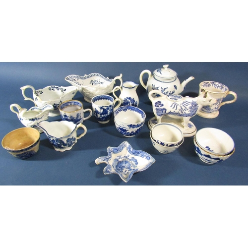 1076 - A collection of late 18th century crescent Worcester porcelain comprising teapot, gravy boats, tea b... 