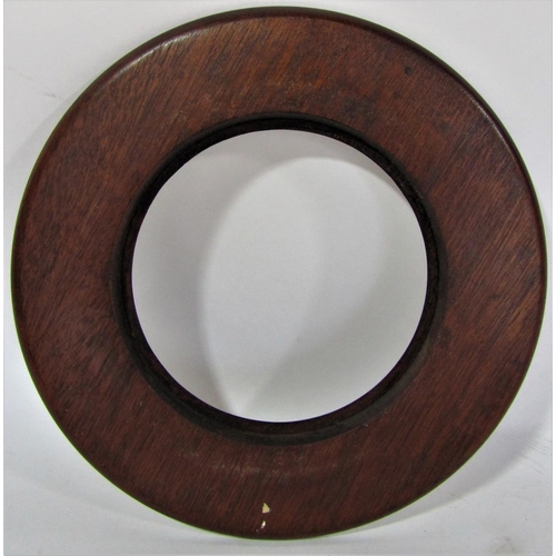 1634 - Five turned and polished circular frames 26cm in diameter max