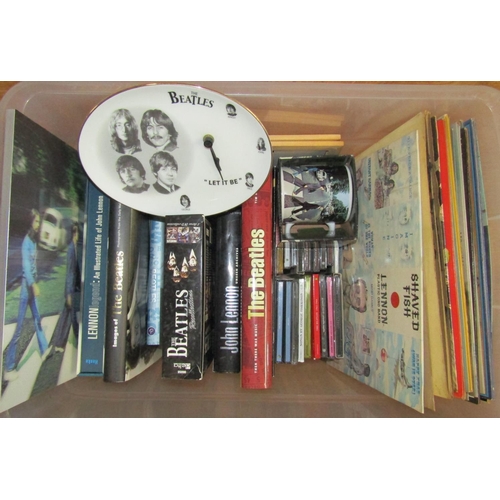 280 - A collection of Beatles memorabilia including a number of books with a bias towards John Lennon incl... 