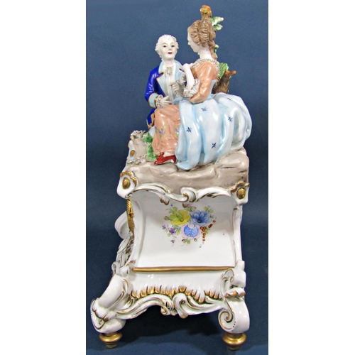 1443 - A contemporary porcelain mantle clock in the romantic style, surmounted by male and female character... 