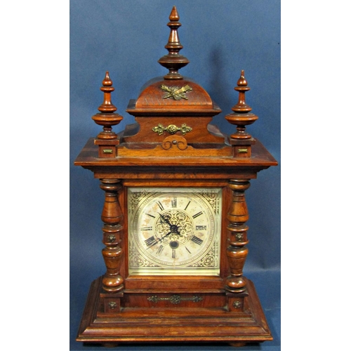 1445 - Late 19th century walnut mantle clock, the case of architectural form with turned spindle mouldings ... 