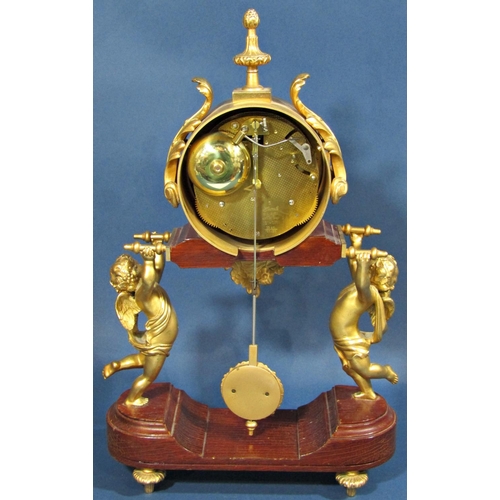 1449 - A contemporary mantle clock, the movement held aloft by two cherubs, with painted dial - Charles Bey... 